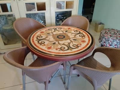 plastic dinning table and 4 chairs