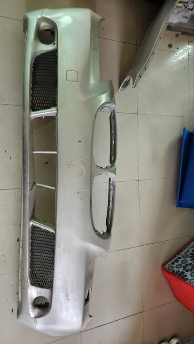 BMW E60 OEM front back bumpers + side skirts
