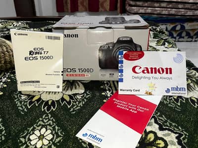 canon 1500D with lens and bag