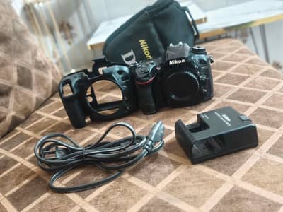 Nikon D7100 DSLR Camera Body with multiple accessories