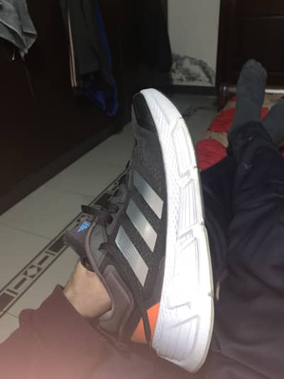 Adidas Questar 2 Bounce running shoes.