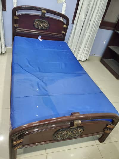 single bed and a dressing table