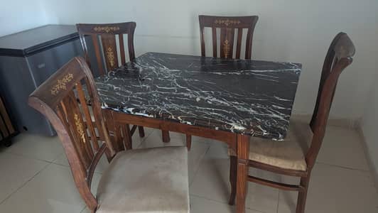 dining table with four chairs