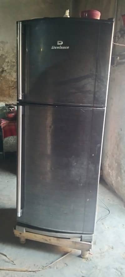 Dawlance freezer compressor damage. 10 by 8 new condition