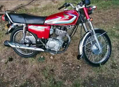 Honda 125 CG bike Rawalpindi ka number 2016 model 03.29. 70.90. 19.3