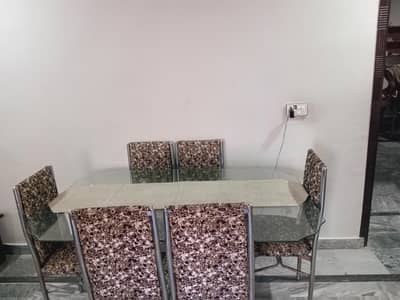 Dining table with chairs. good quality Glass on top