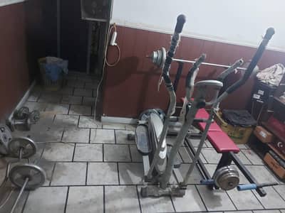 plates benchpress and gym stuff