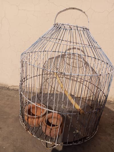 cage and wooden closet