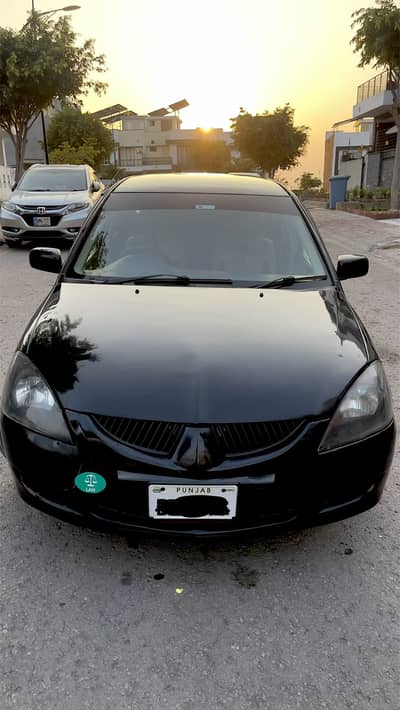 MITSUBISHI LANCER (16km/L average )