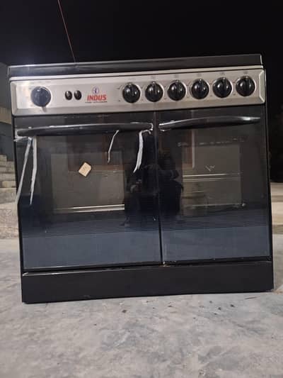 cooking range in used  but  in new condition.