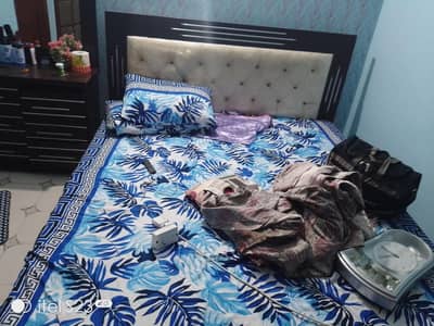 bed and dressing table