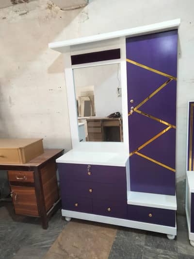 bed with sidetables and dressing