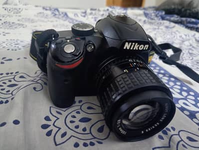 Nikon d3200 with 100mm manual lens & camera box