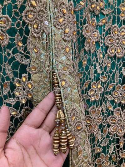 embalised net dress with jamawar truser