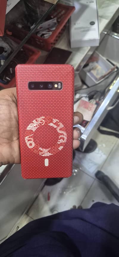 Samsung s10 plus.  12/1TB