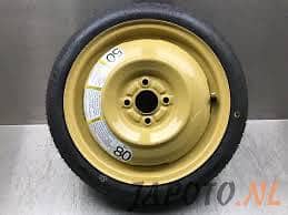 Suzuki Swift pulled out space saver spare wheel 14 Inch