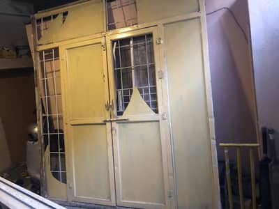 Iron door with glass and grills