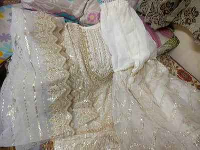 white and gold grara suit