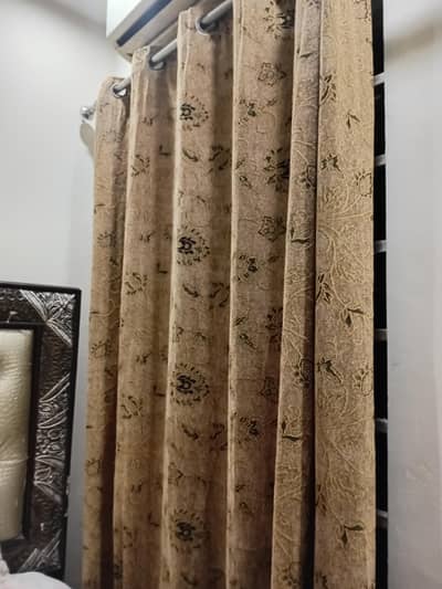 a beautiful and long curtain in used condition taken from curtain shop