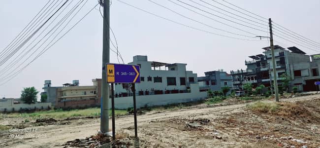 10 Marla Residential Plot Near Park on 60 Ft Road Near Market And Boulevard for Sale in Block M, LDA Avenue 1 Lahore Ideal Location Between Built Homes