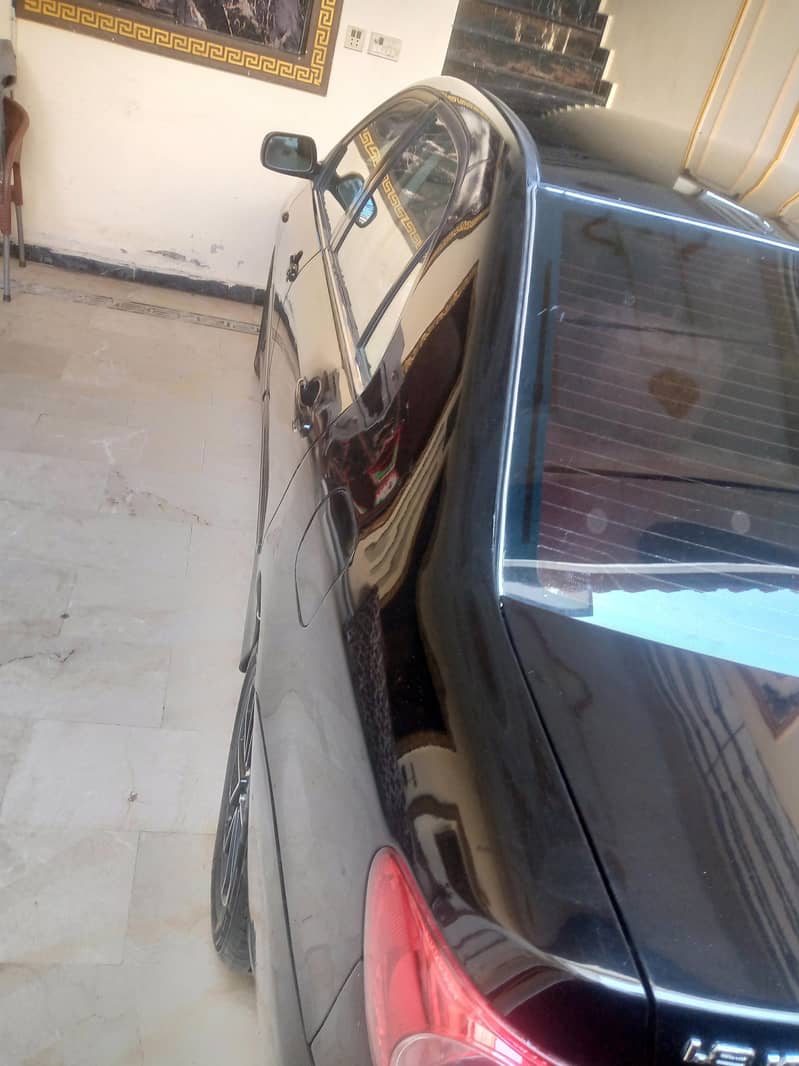 Corolla altis 1.8 12