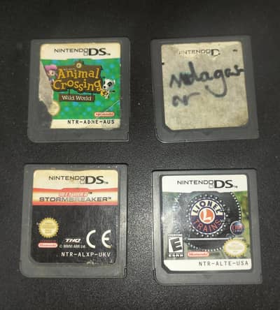 Animal crossing wild world + 3 other Nintendo DS games