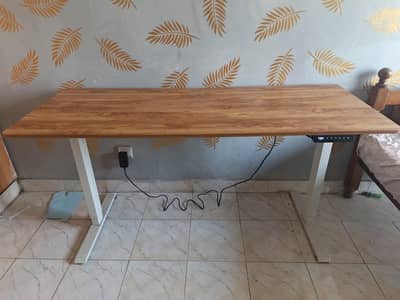 Office table (Height Adjustable) imported from Uk myself