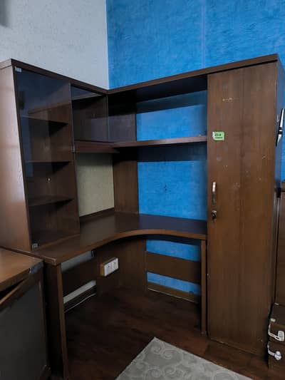 a book shelve with single cupboard