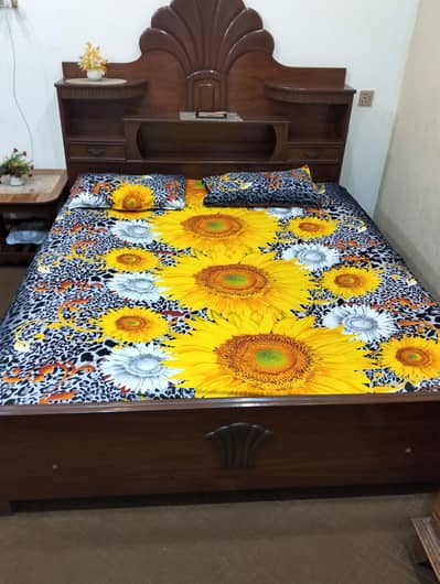 double bed with two side tables