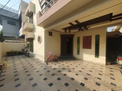 Luxurious 10 Marla Double-Storey Masterpiece | Ideal for Elite Living |