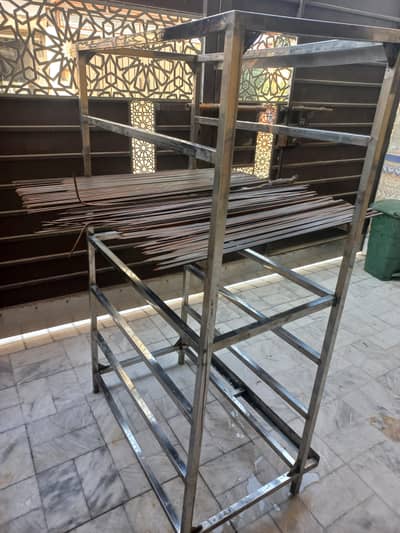 Barbecue stand and skewers