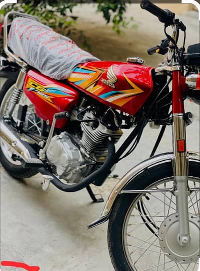 Honda 125 red unregistered