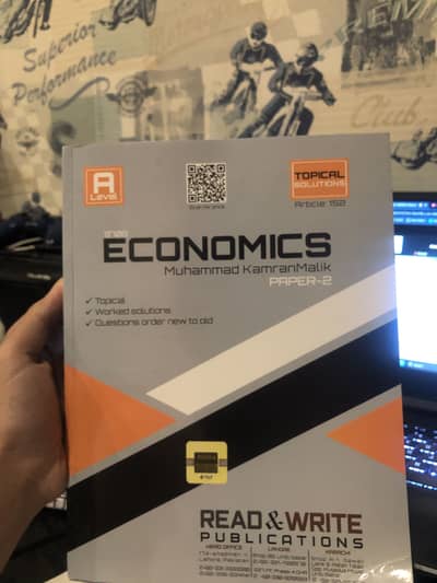 CIE A LEVELS ECONOMICS TOPICAL PAST PAPERSi