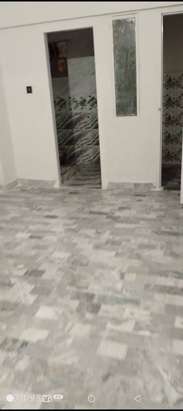 Flat For Sale In Iqra Complex 2 Bed long 2nd Floor Marble Floor All Facilities  Builder Transfer fails