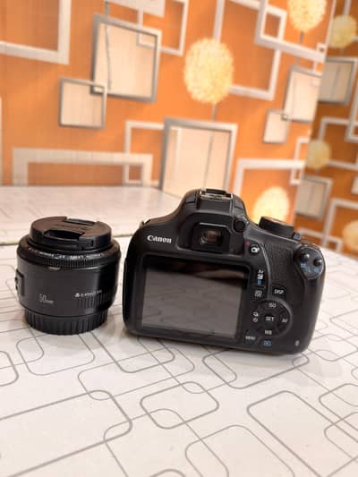 canon 1200D with 18-55 kit lens & 50mm 1.8 lens