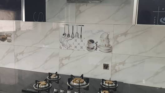 5 Marla Double Story House for Rent in Iqbal Town, Lahore   Property Details: - 4 spacious bedrooms  - 2 elegant TV lounges  - 2 modern kitchens  - car garage - Tile flooring throughout  - Prime location: near Near Market Near Park and Near Mosque      Contact Gilani Estates & Builders, your trusted real estate partner, located in Allama Iqbal Town, Lahore, to schedule a visit and make this property yours!