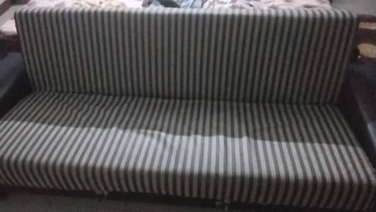buy this sofa bed just for  35000 it has under storage also