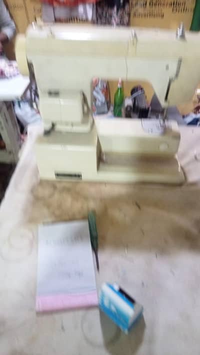 sewing and deziner machine