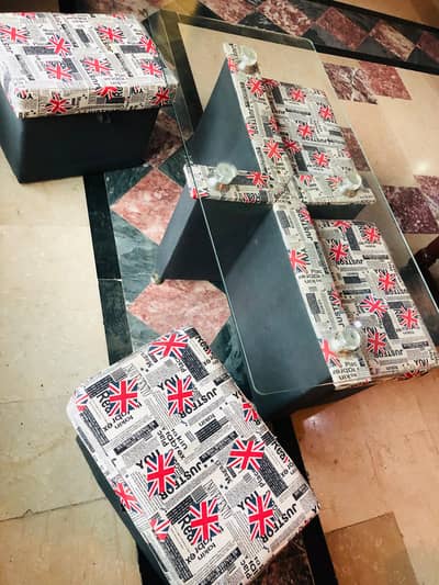 small dining table with 4 sitting stools