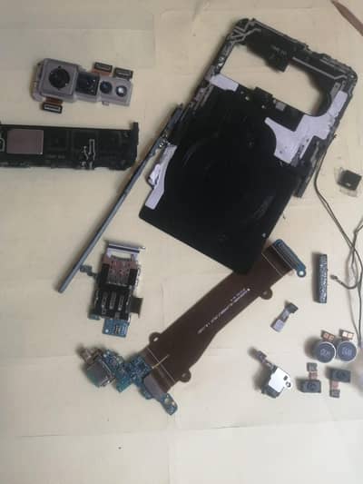 lg v60 parts se in pics orgnal chaging strips