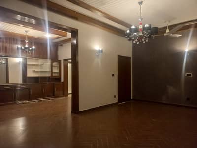 1 kanal well maintained semi furnished lower portion available for rent