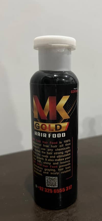 MK gold hair oil
