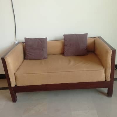 2 Seater 2 Wooden Sofa – Good Condition – Strong Frame