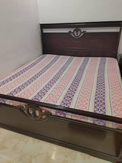 Double bed with side tables and mattress