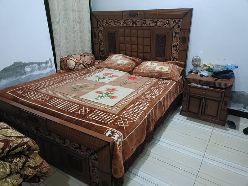 Bed with side table and sofa 0