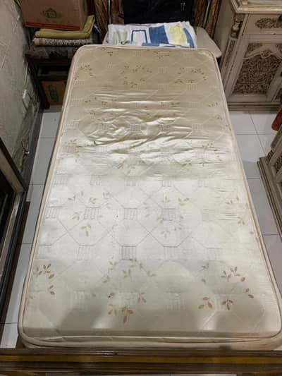 bed with spring mattress