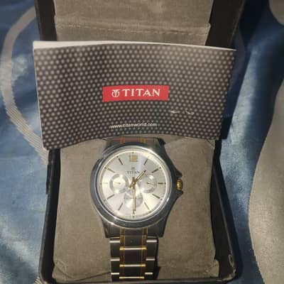 Titan sliver Gold analog watch,