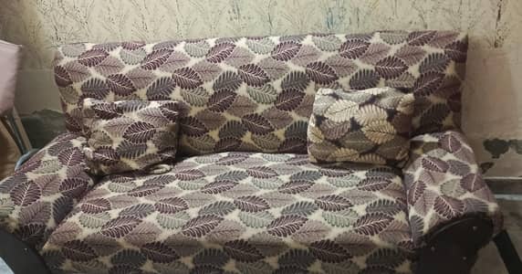 Three seater , single piece sofa.