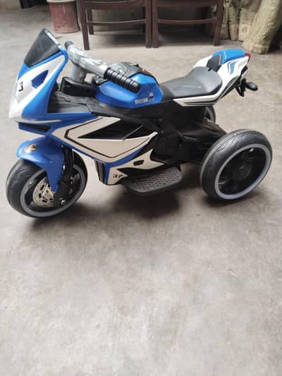 Three wheel electric bike for kids .