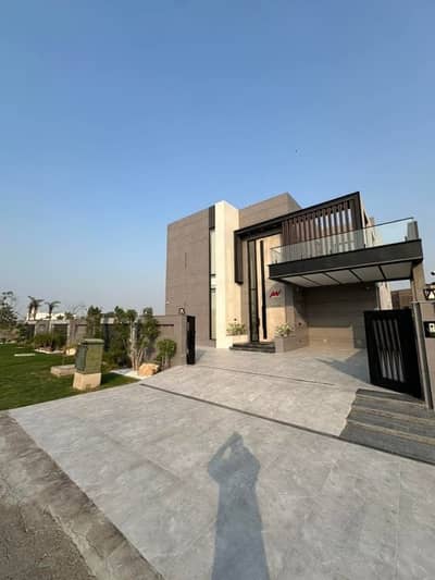FULLY FURNISHED MODERN 2-KANAL (1+1) SUPER HOT LOCATED BUNGALOW WITH POOL AND THEATRE IS AVAILABLE IN THE BEST BLOCK OF DHA PHASE 6 LAHORE.